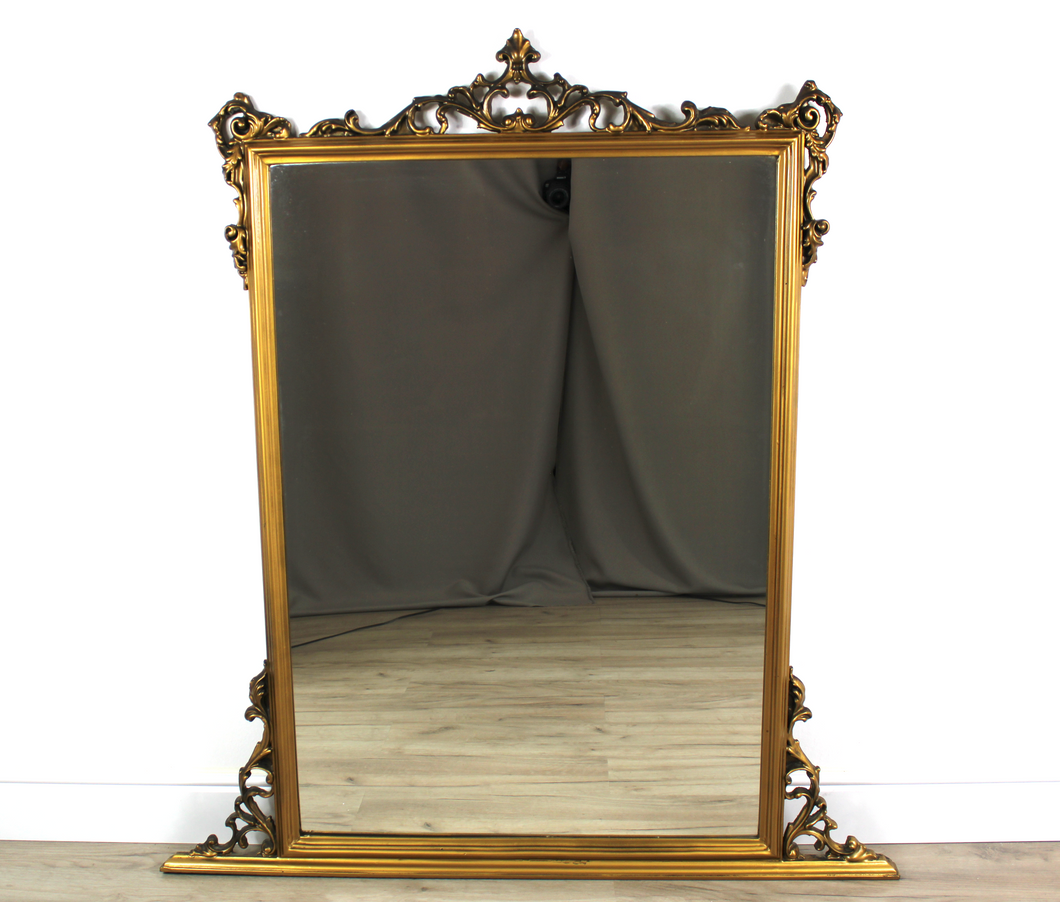 Specchiera da appoggio con cornice in legno dorata